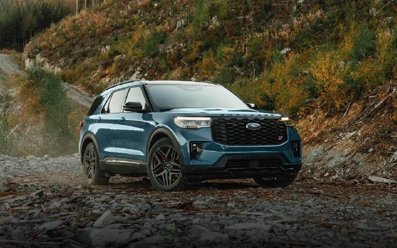 Ford Explorer SUV parked on a wooded trail